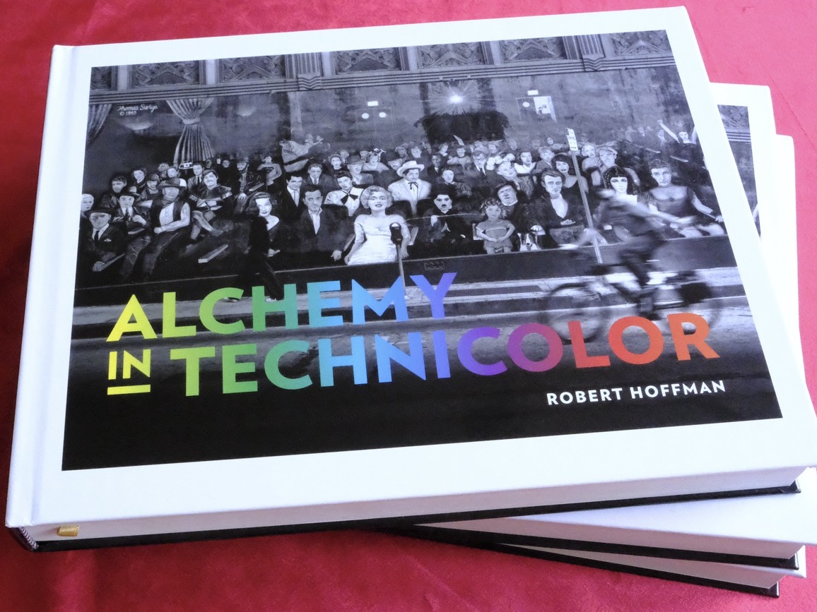 Two copies of the Alchemy in Technicolor hardcover, photographed by Robert Hoffman